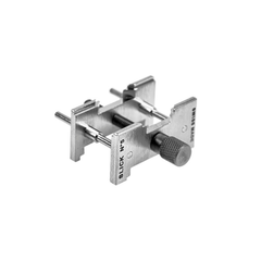 SLICK extendable and reversible movement holder